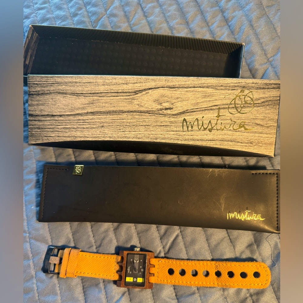 Mistura wooden watch with a black face with yellow highlights